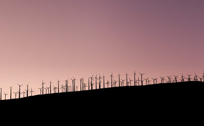 distant wind turbines silhouetted pink sky|SP15 Day-Ahead Prices|Hourly average breakdown of total production by resource type|CAISO decrease in midday electricity prices due to solar|Hawaiian Electric Interim Time of Use Rates|distant wind turbines silhouetted pink sky|distant wind turbines silhouetted pink sky|Hourly wind solar generation curtailment energy in MWh