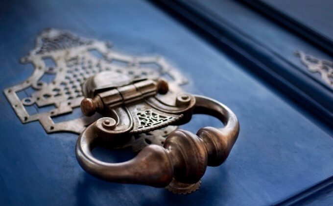 closeup of ornate metal knocker on blue door|2016 New Generation Capacity Additions by Fuel Source|closeup of ornate metal knocker on blue door