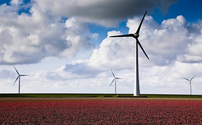 wind turbines in flat farm field|wind turbines in flat farm field|wind turbines in flat farm field