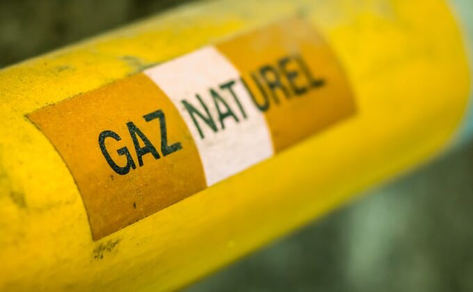yellow gas pipeline with words natural gas in french written on it