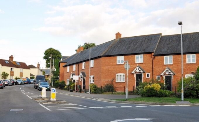 View of houses on a road in a typical British town