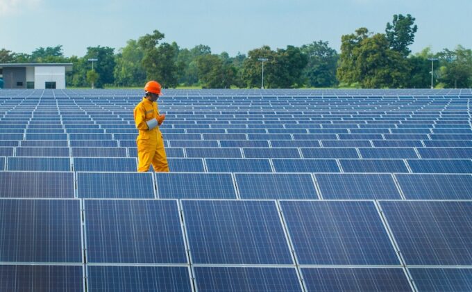 Man with Solar Panels|Man with Solar Panels|Man with Solar Panels