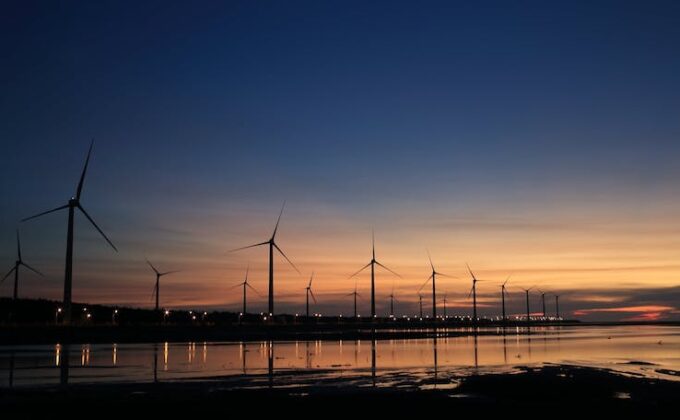 wind turbines at sunset