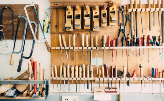 woodworking tools hanging on wall