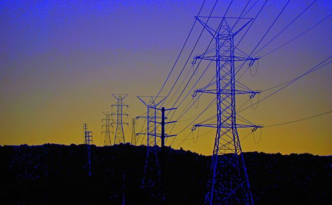 electricity transmission lines and towers in twilight|electricity transmission lines and towers in twilight|electricity transmission lines and towers in twilight|energy supply curve showing value of lost load against price cap