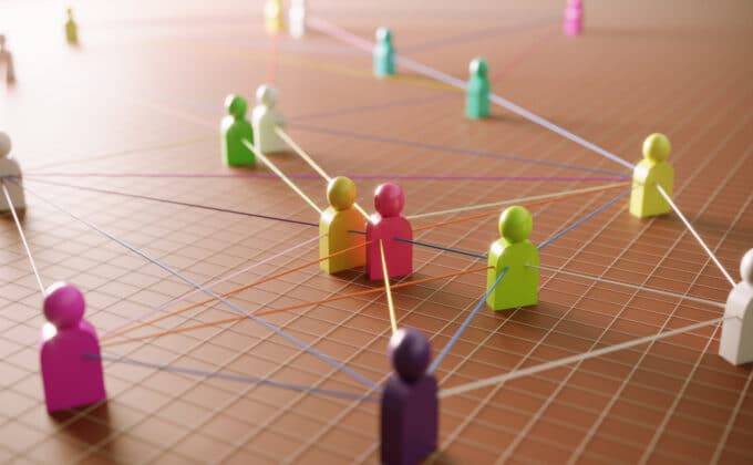 web of 3D figures connected through a network